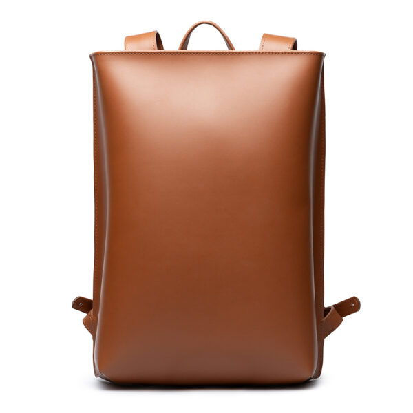 Minimalist brown leather backpack ARCH EDGE BACKPACK BROWN with a structured silhouette and adjustable straps.