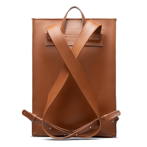 Minimalist brown leather backpack ARCH EDGE BACKPACK BROWN with a structured silhouette and adjustable straps.